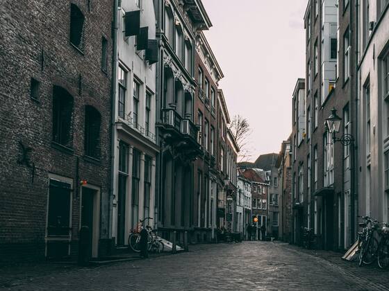 Narrow cobbled street in an old European city